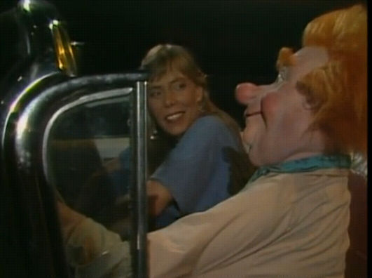 Joni and The Wild Impresario take their night ride in a Cadillac by moonlight. 