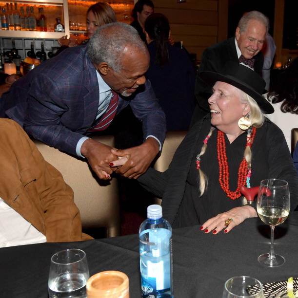 Danny Glover talking to Joni Mitchell at The Award Ceremony.  Photo by Lester Cohen [NYCRobert]