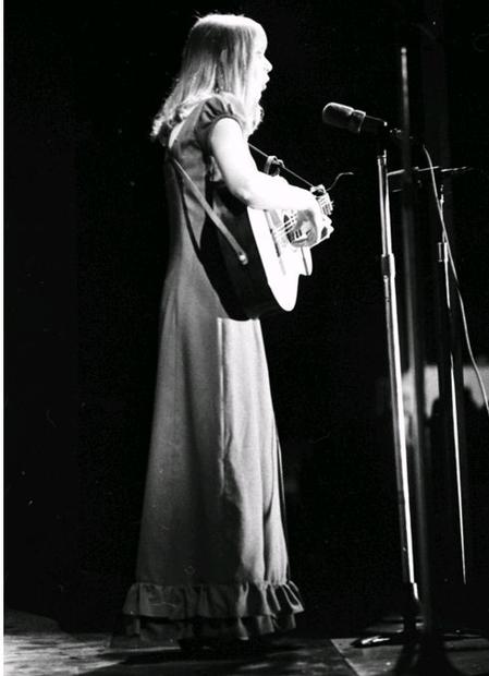 Joni performing on stage.<br>
Photo from York University. 