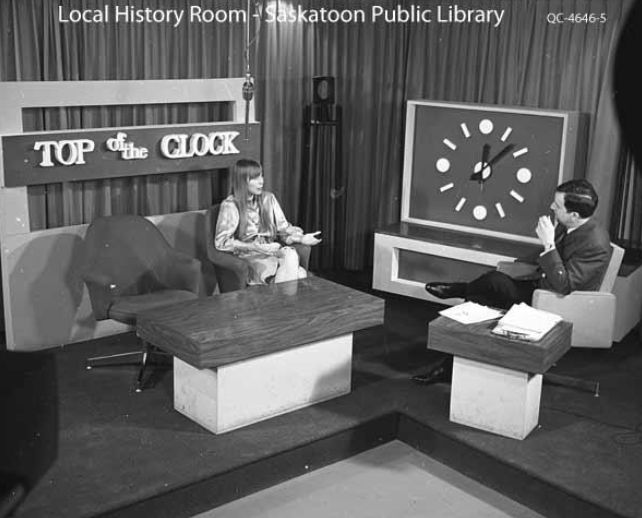 Joni being interviewed by Verne Prior at CFQC-TV studio.  Photo by CFQC staff.
