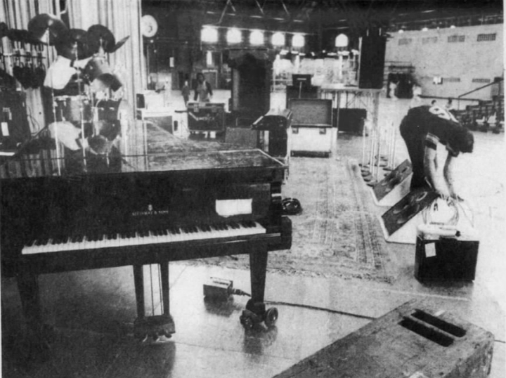 Ithaca Journal (1974.02.23): The stage - just a cluster of tables pushed together - is nearly equipped by 1pm. The litter of instruments, electronic gear and lights looks organized only to performers. 